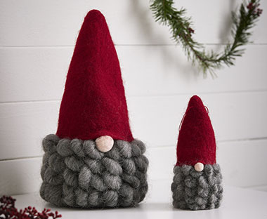 Elfi natalizi grande e piccolo con berretto rosso