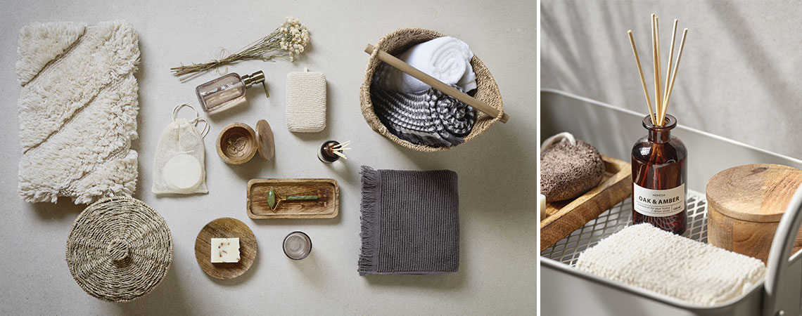 Baumwollhandtücher, Duftöle und andere Badezimmer-Accessoires auf beigem Hintergrund