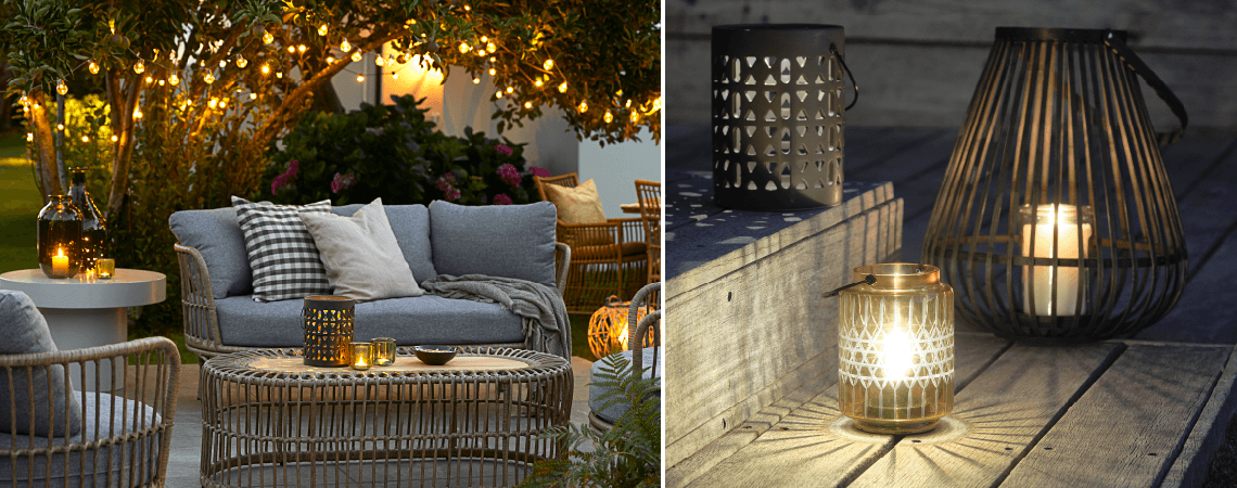 Gartenmöbel auf der Terrasse am Abend mit Gartenleuchten und Gartenlaternen, die warmes Licht ausstrahlen