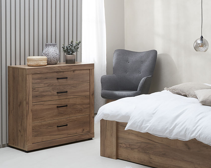 LINTRUP chest of drawers and SKALBORG armchair Wooden chest of drawers in bedroom