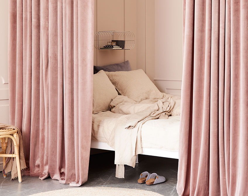 AUSTRA curtains are available in rose, blue, sand, grey and green Rose coloured curtains used to separate a sleeping area from a large living room