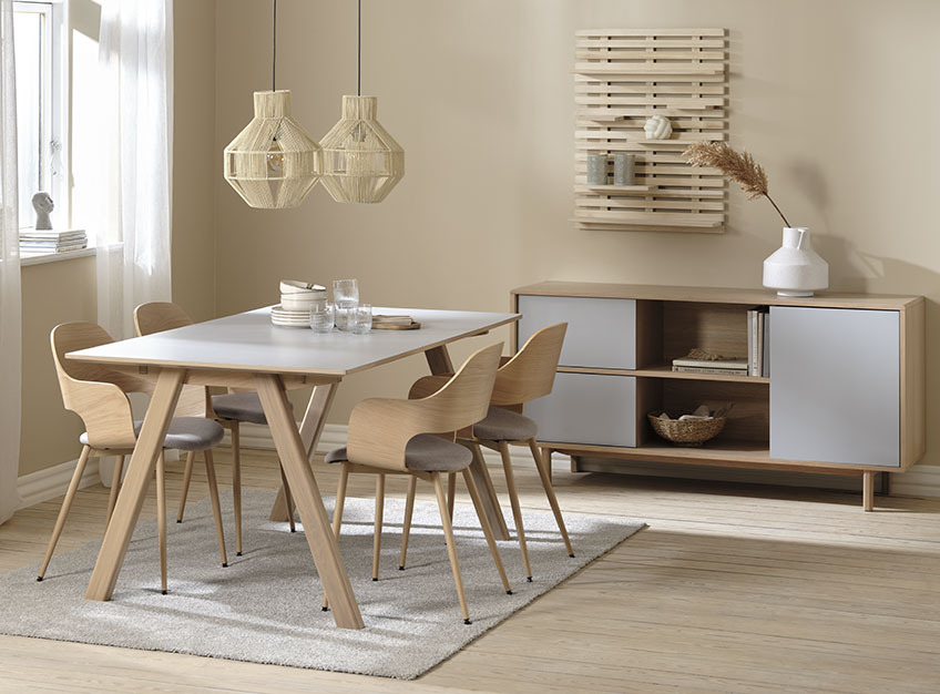 EGEBJERG sideboard and dining table, HVIDOVRE dining chairs, and VILLEPLE rug Dining room with dining table and chairs on rug